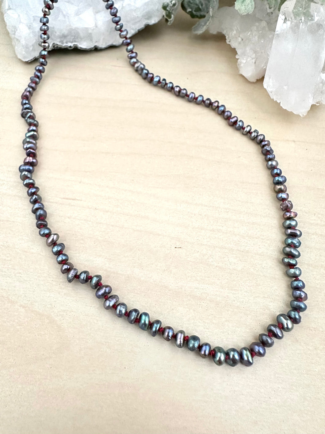 Dark Pearl Strand Hand knotted on Red Silk