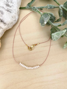 White Pearl Bar on a Silk Cord