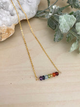 Load image into Gallery viewer, Gemstone bar necklace arranged in the colors of the rainbow. 